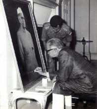 President Shri Fakhruddin Ali Ahmed signing a painting made by Captain Arul Raj