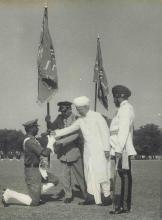 President Dr. Radhakrishnan presenting new Regimental Colours to the Rajput Regiment, Fatehgarh