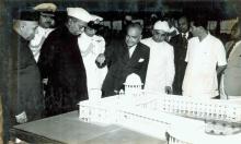 President Dr. Rajendra Prasad being shown a model of the new Supreme Court building, New Delhi