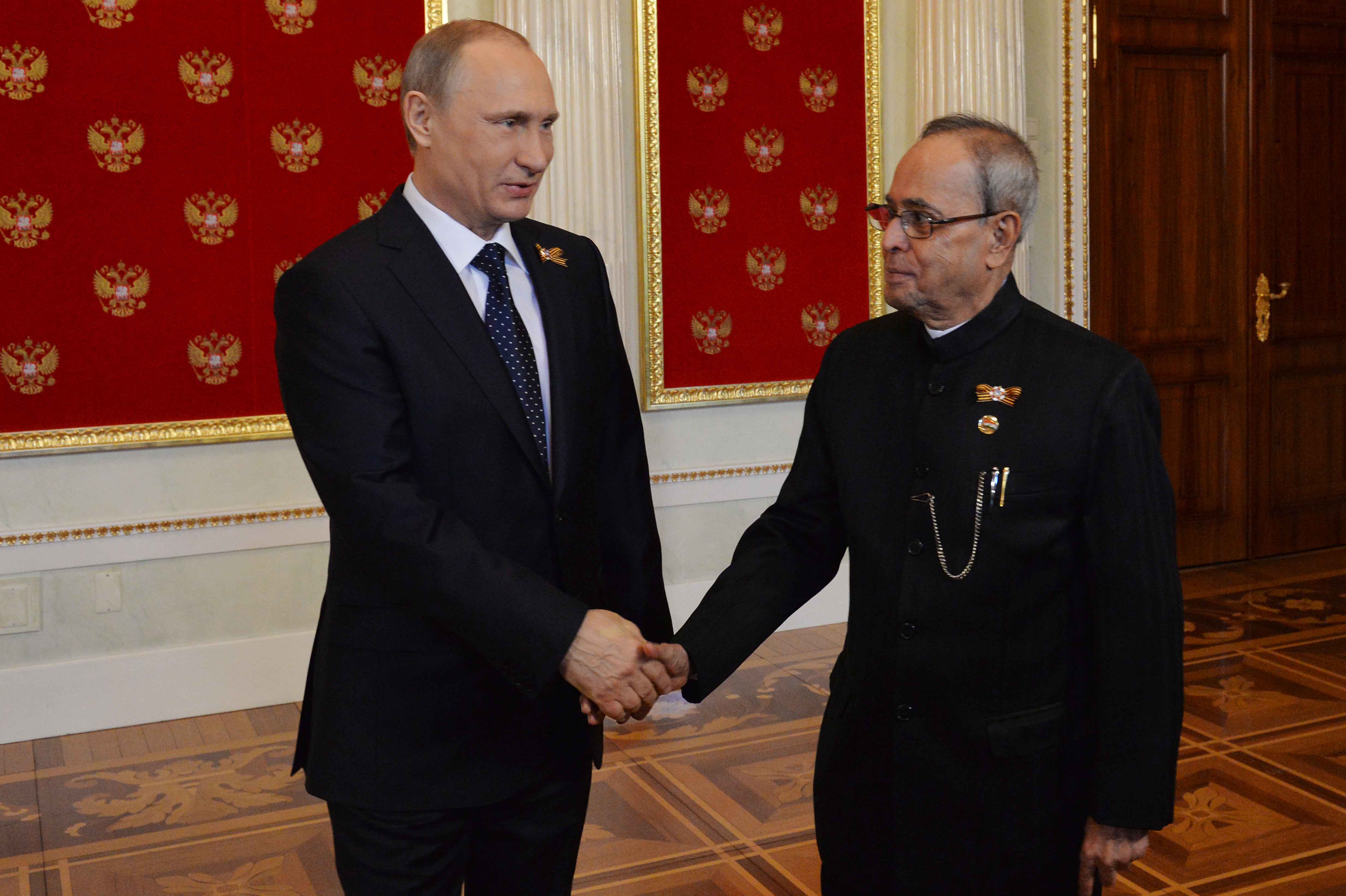 The President of India, Shri Pranab Mukherjee being received by the President of the Russian Federation, H.E. Mr. Vladimir V Putin on his meeting at Kremlin in Russia on May 9, 2015.