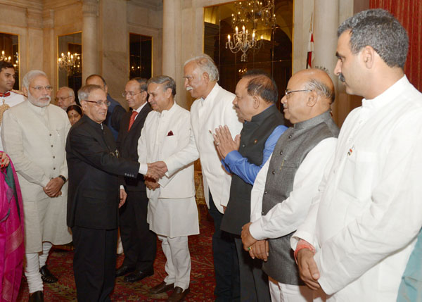 The President of India, Shri Pranab Mukherjee, the Prime Minister of India, Shri Narendra Damodardas Modi at the dinner hosted by the President at Rashtrapati Bhavan in New Delhi on May 28, 2014 for the Prime Minister and the Union Council of Ministers. 