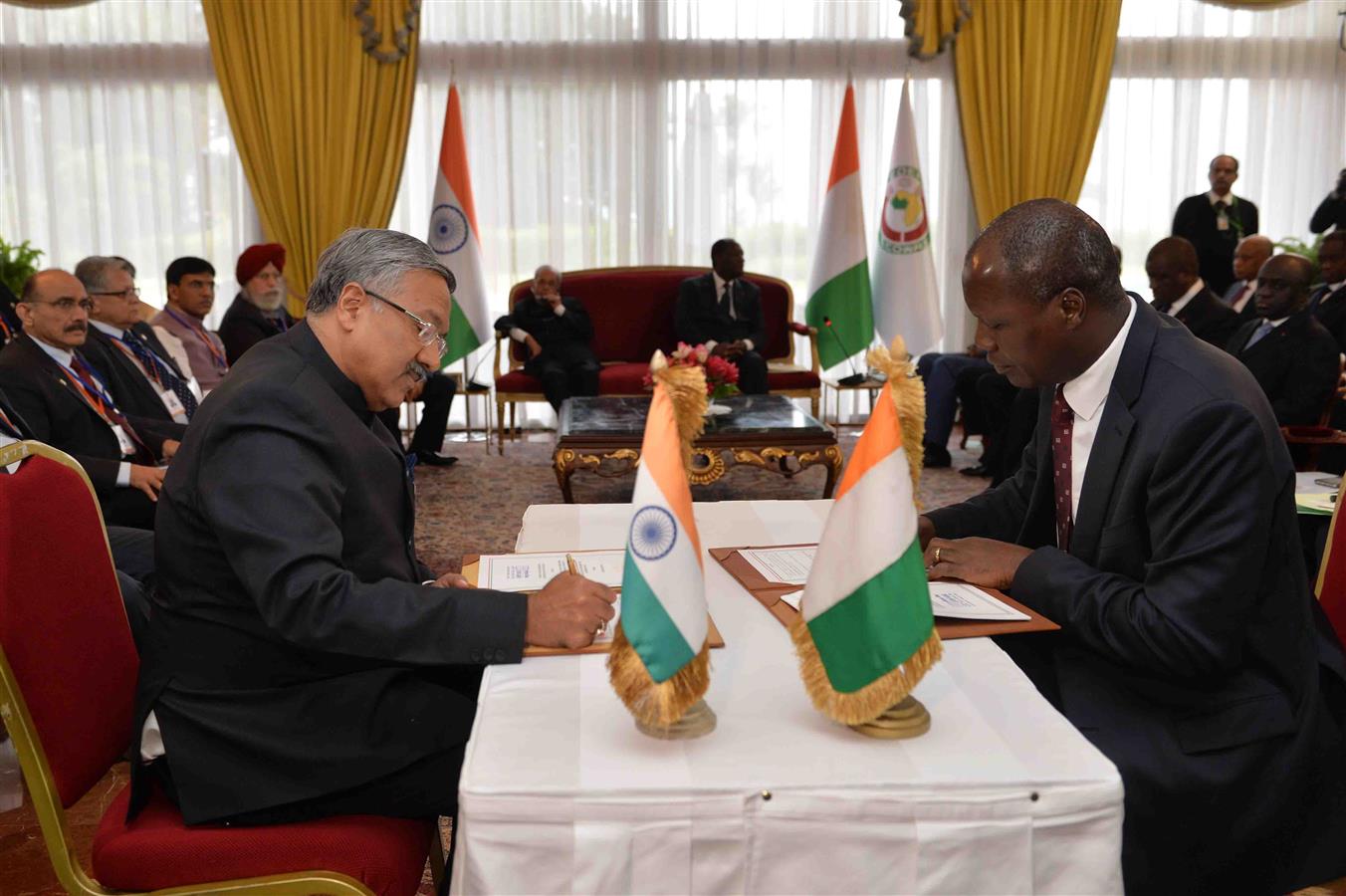 The President of India, Shri Pranab Mukherjee with the President of the Republic of Cote d’ lvoire, H.E. Mr. Alassane Ouattara witnessing the Signing of Agreements (EXIM Bank) between India and Republic of Cote d’ lvoire at Presidential Palace in Republi 