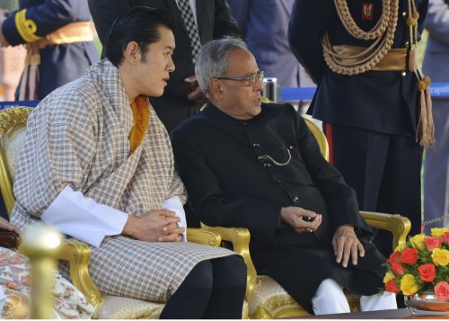 The President of India Shri Pranab Mukherjee and the Chief Guest at the 64th Republic Day Celebrations, the King of Bhutan, His Majesty, Jigme Kheser Namgyel Wangchuck at the 'At Home' Reception hosted by the President on the lawns of the Mughal Gardens o
