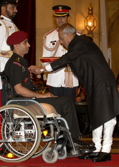 The President of India, Shri Pranab Mukherjee presenting Shaurya Chakras to Lieutenant Manish Singh at the Defence Investiture Award Ceremony at the Darbar Hall of Rashtrapati Bhavan in New Delhi on April 27, 2013.