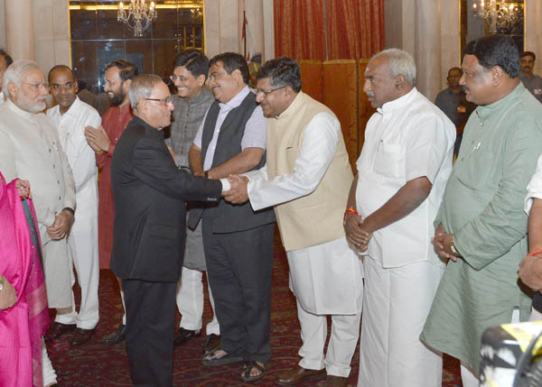 The President of India, Shri Pranab Mukherjee, the Prime Minister of India, Shri Narendra Damodardas Modi at the dinner hosted by the President at Rashtrapati Bhavan in New Delhi on May 28, 2014 for the Prime Minister and the Union Council of Ministers. 