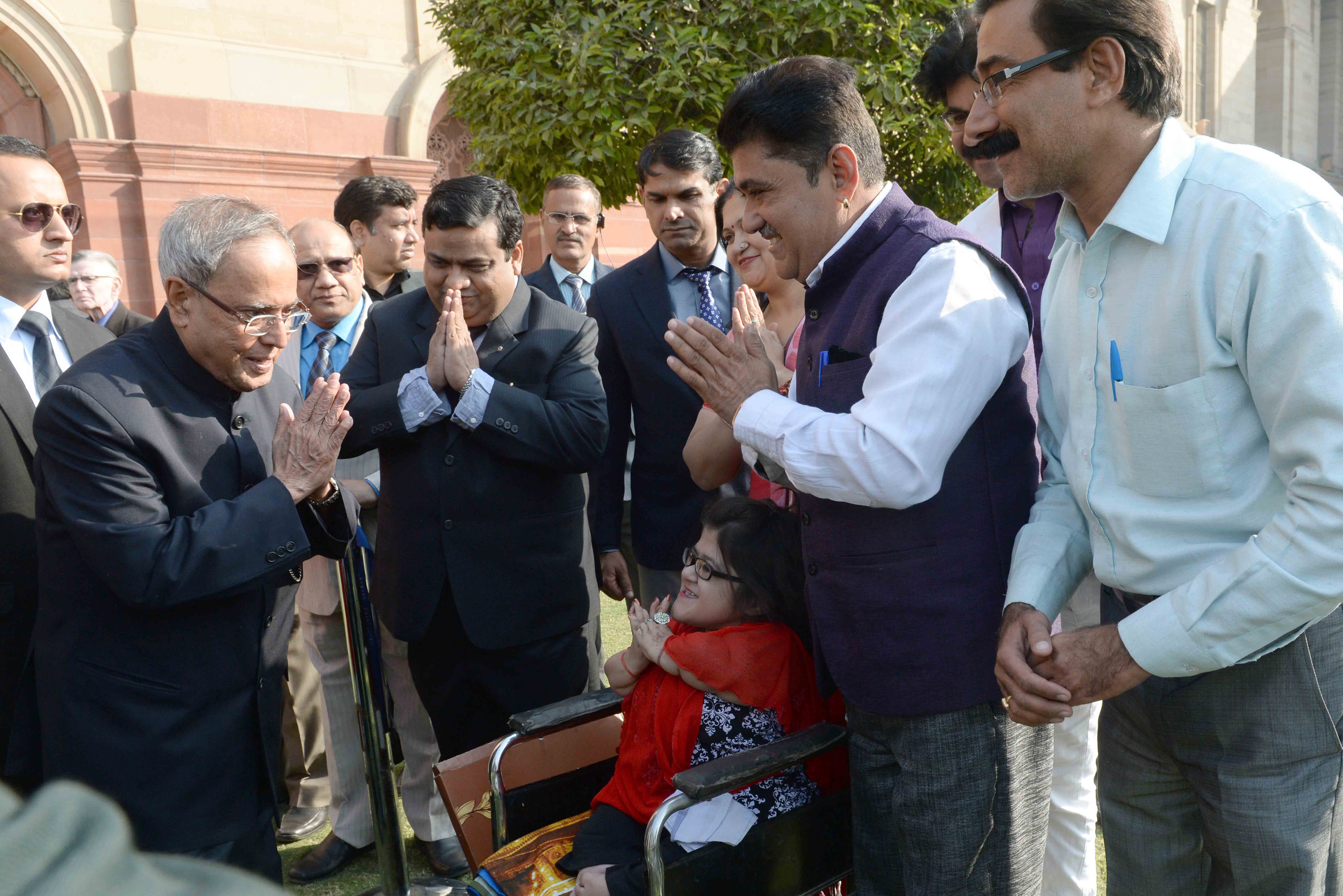 The President of India, Shri Pranab Mukherjee receiving greetings from the public visitors on the occasion of his birthday at Rashtrapati Bhavan on December 11, 2014. 