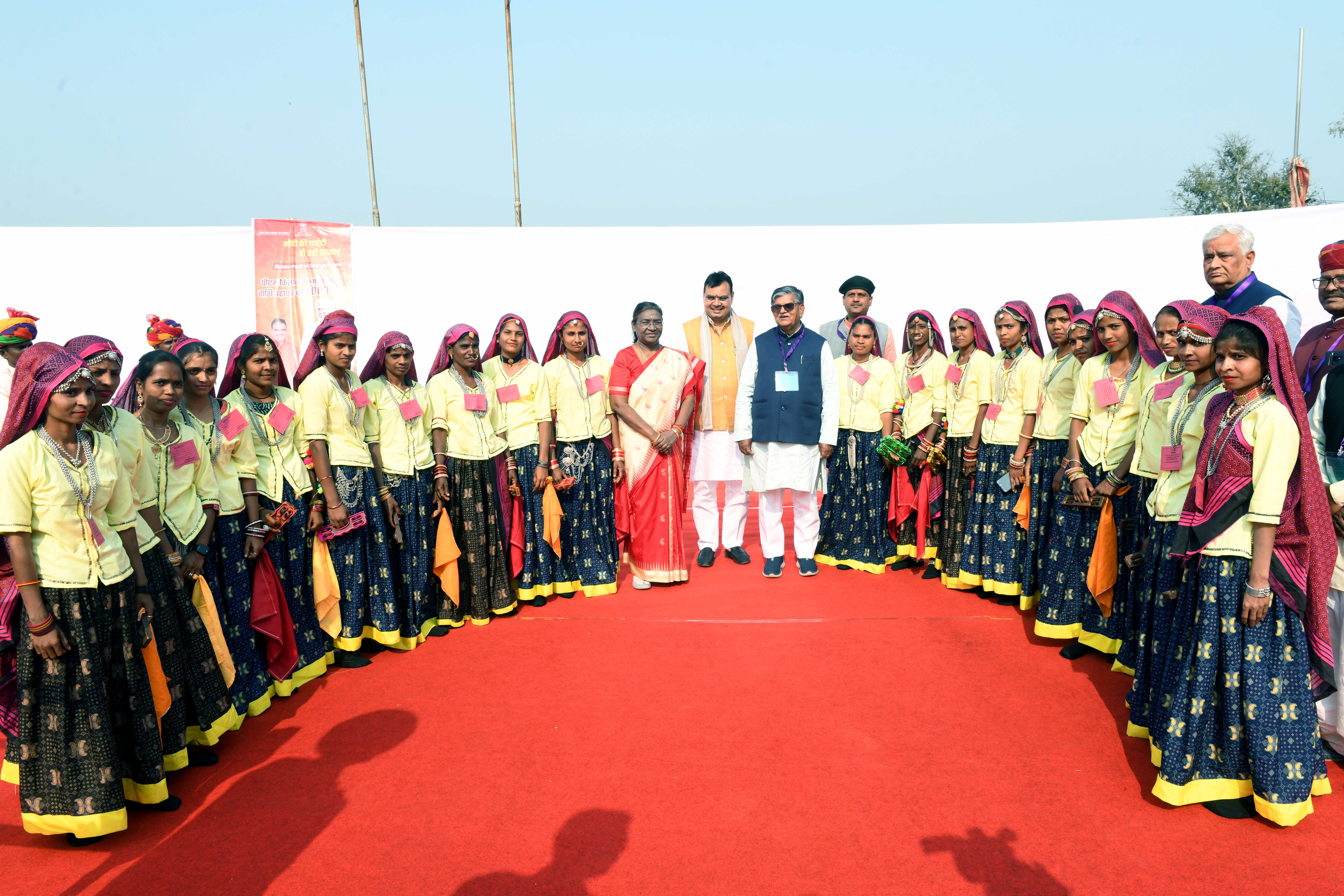 The President of India, Smt Droupadi Murmu addressed a gathering of tribal women associated with various Self Help Groups of Rajasthan at Beneshwar Dham, Rajasthan on February 14, 2024.
