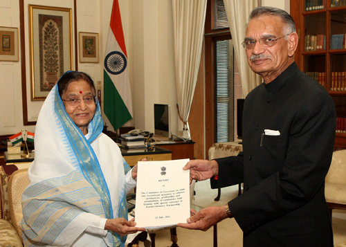 The President of India, Smt. Pratibha Devisingh Patil receiving the Report on 'Farmer-Industry Partnership' from the Governor of Punjab, Shri Shivraj Patil, at Rashtrapati Bhavan on July 12, 2012 . The President had set up a 13- member committee on Octobe